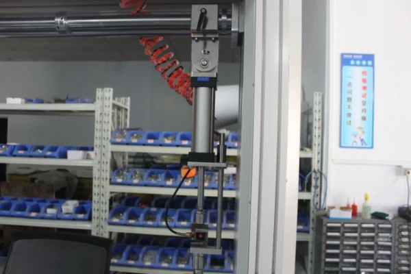 Furniture testing machine configured with loading fixtures, sensors and a test sample
